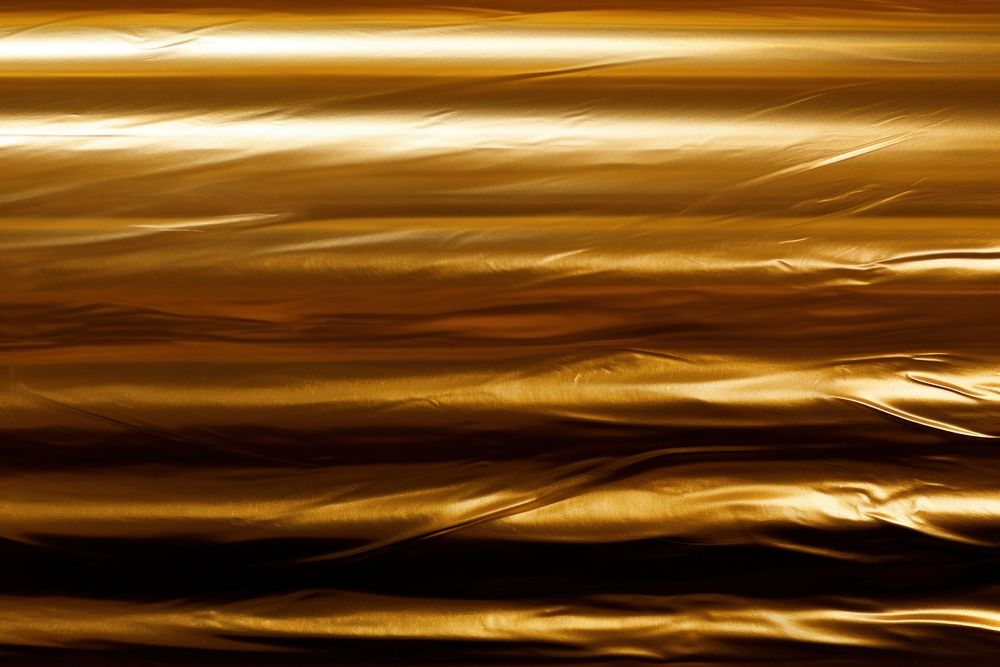  Gold plastic wrap backgrounds transportation automobile. AI generated Image by rawpixel.