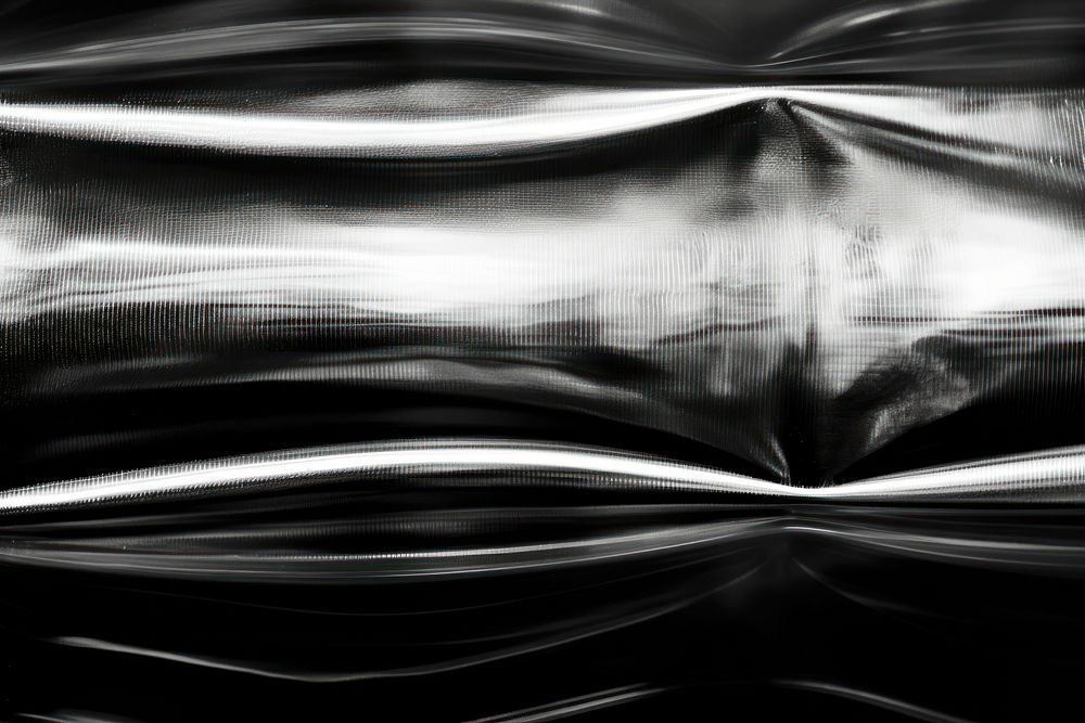  Transparent plastic wrap black backgrounds transportation. AI generated Image by rawpixel.