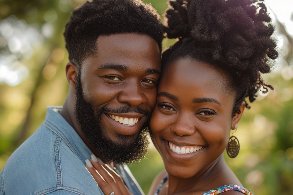 Black couple celebrating loving laughing.