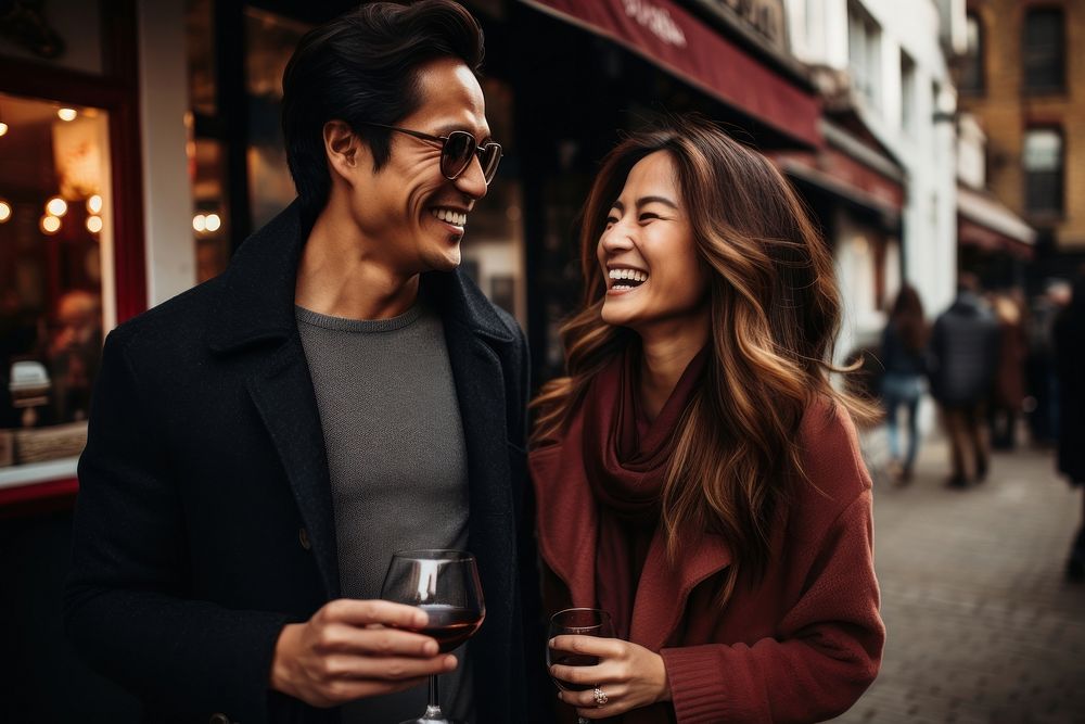  Thai couple laughing drinking street. AI generated Image by rawpixel.