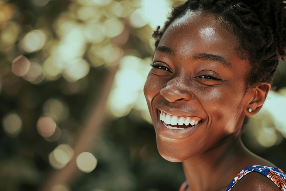 Black woman laughing portrait smile.