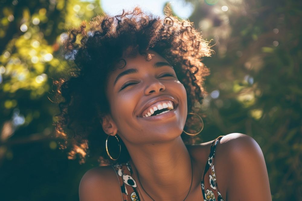 Black woman laughing portrait smile.