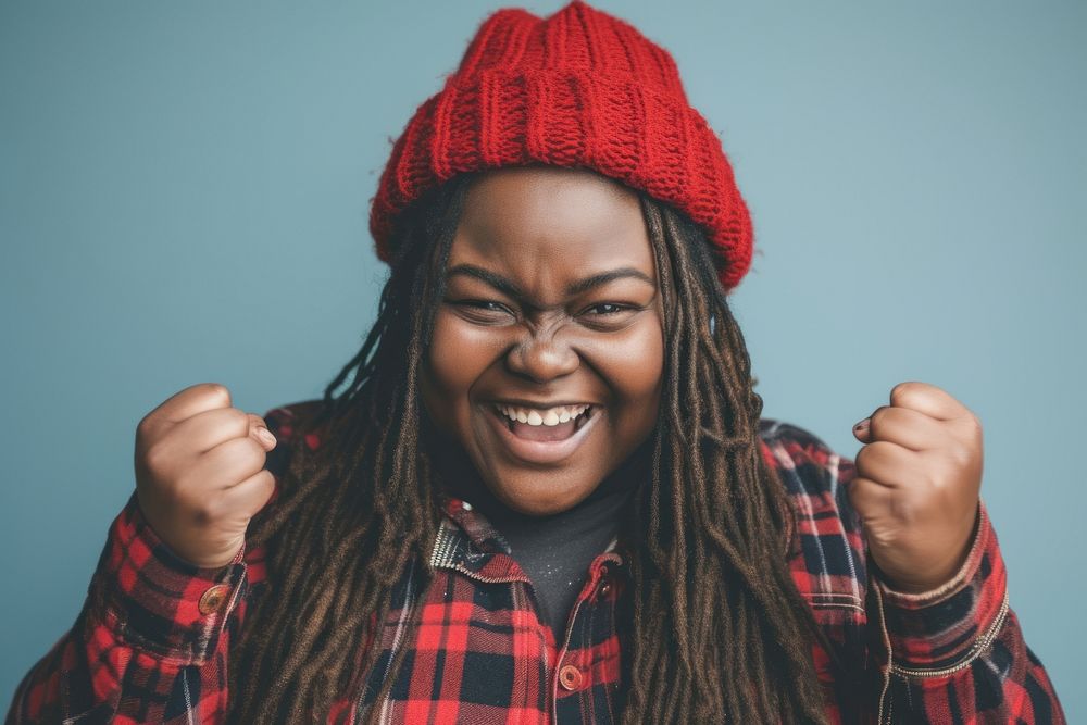 Cool chubby young black woman with fashionable clothing style full body on colored background laughing smile fun.