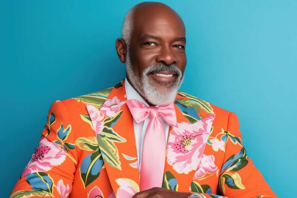 Cool senior black man with fashionable clothing style portrait on colored background adult male photography.