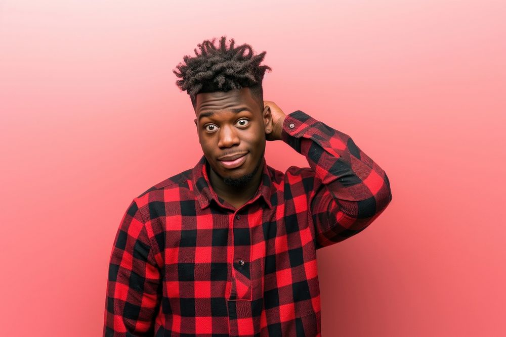 Cool young black man with fashionable clothing style full body on colored background portrait adult frustration.