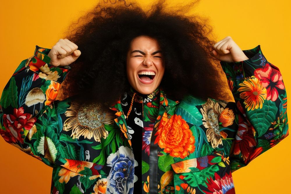 Cool young black woman with fashionable clothing style full body on colored background shouting laughing adult.