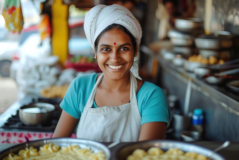 Indian female chef smiling adult cook.