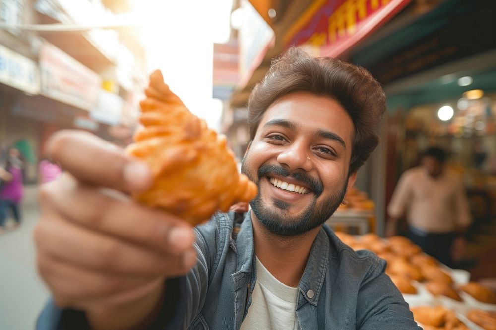 Indian businessman eating food smiling smile.
