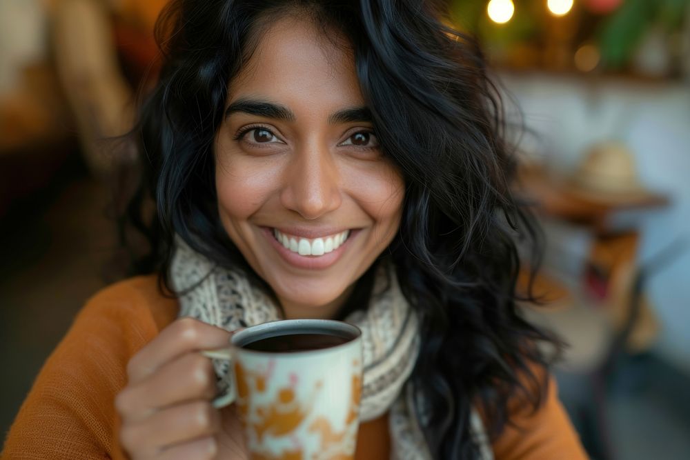 Indian businesswoman drinking smiling coffee smile.