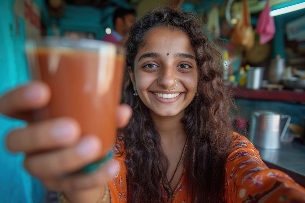 Indian girl making smiling selfie smile.