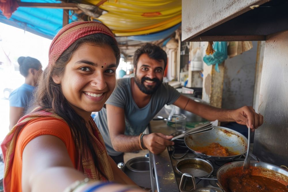 Adult Indian traveller food smiling kitchen.