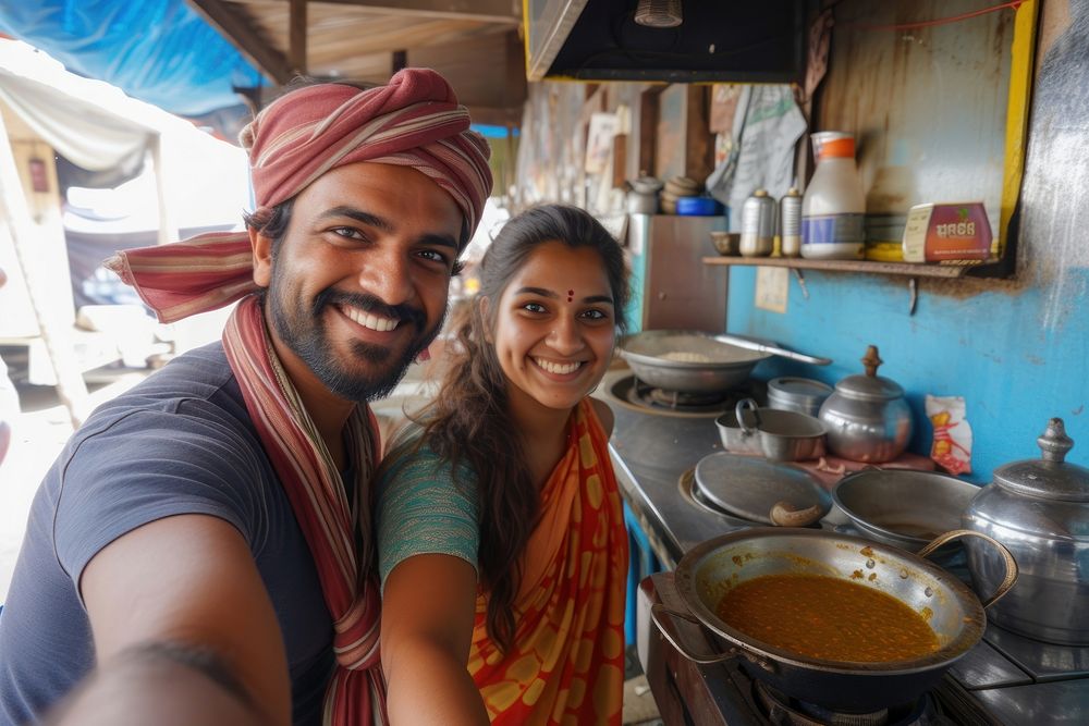 Adult Indian traveller food smiling kitchen.