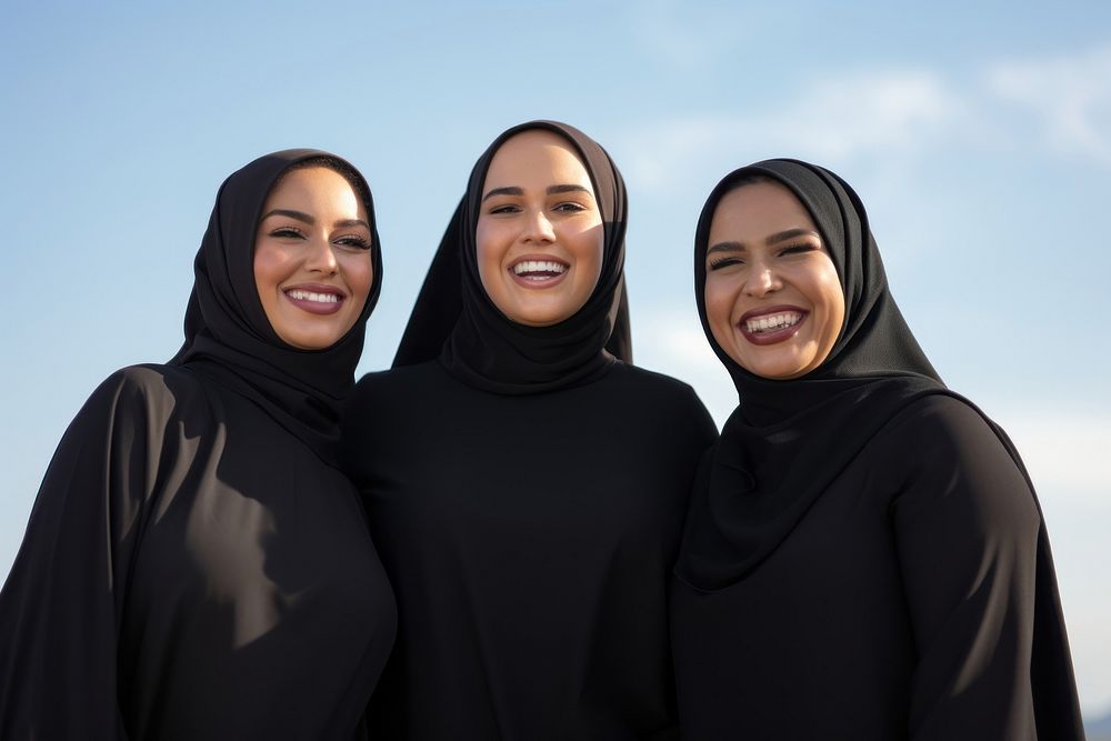 3 plus size Middle eastern women outdoors smiling people.
