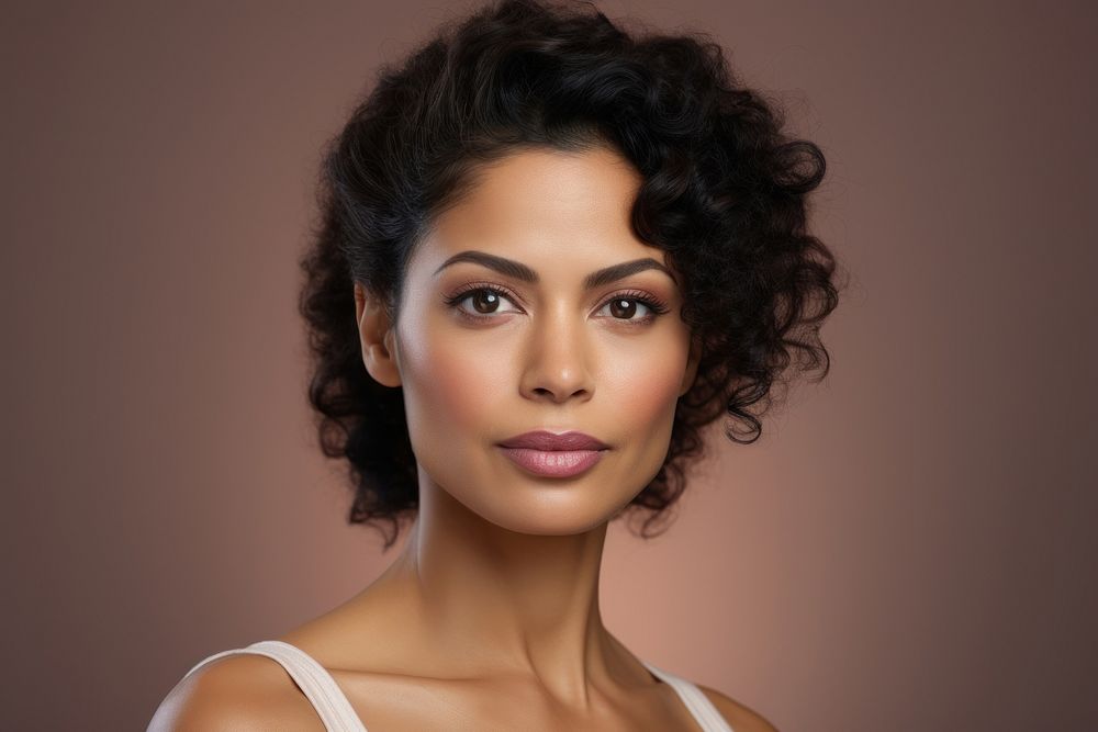 Middle aged multiracial woman wearing natural makeup portrait fashion adult.