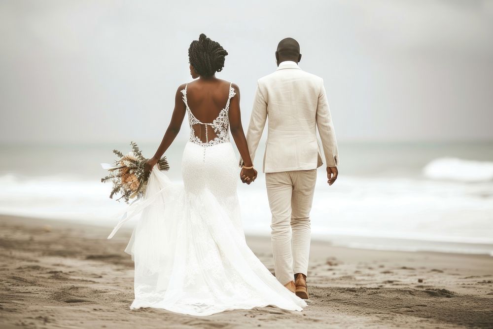 African wedding day couple walking adult bride.