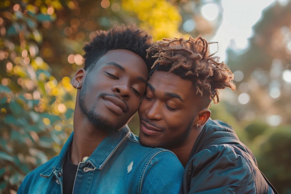 A couple of gay african american adult men affectionate.