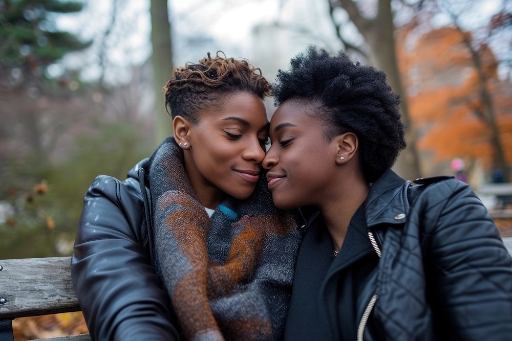A couple of lessbian african american photography portrait kissing.