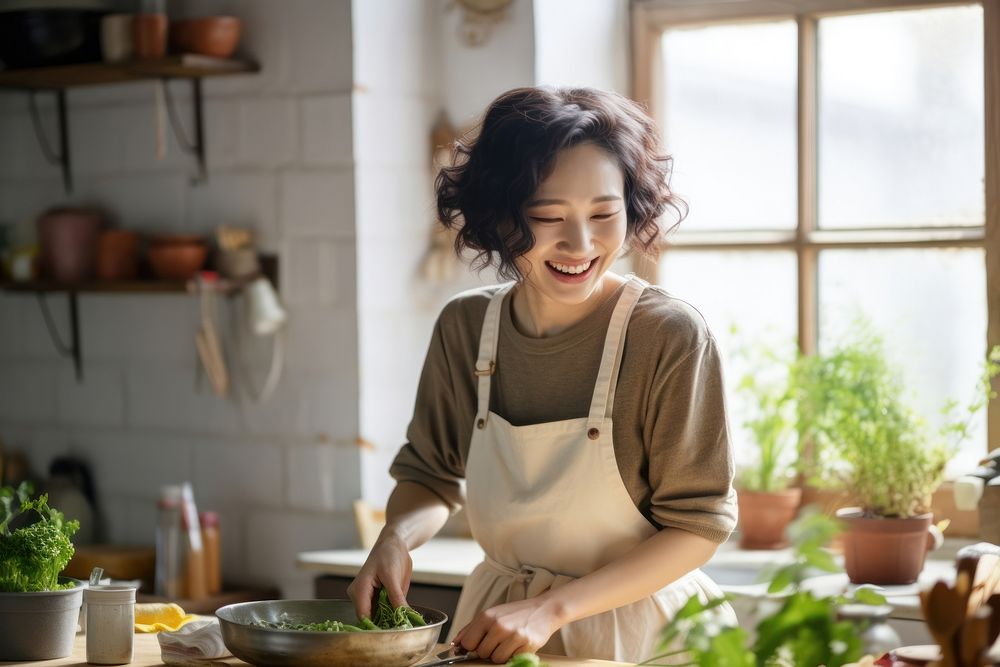 Korean female kitchen cooking adult.