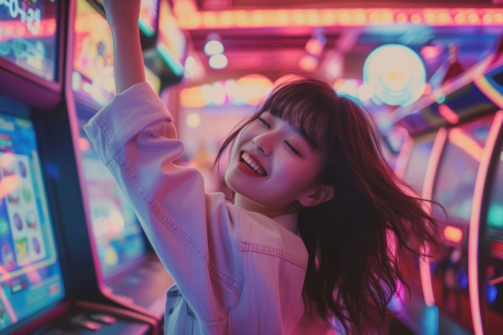Korean teenager dancing on arcade machine nightlife gambling adult.