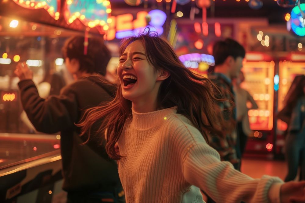 Korean dancing arcade laughing adult joy.