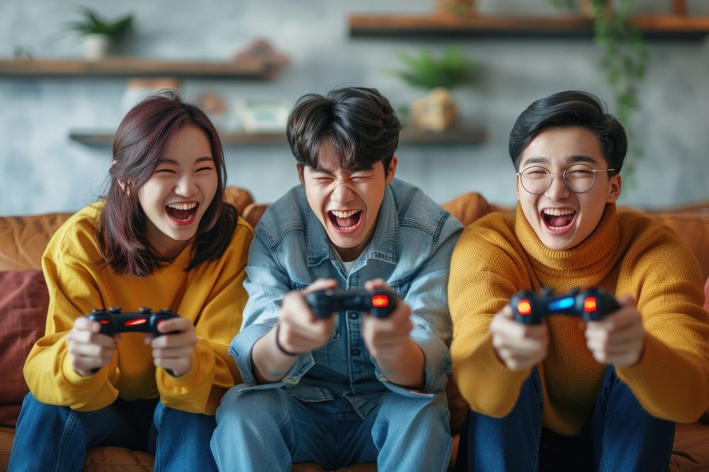 Korean enjoy playing game with friends laughing men togetherness.