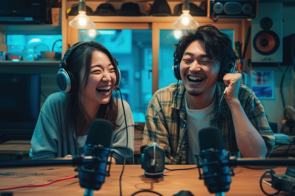 Two Japanese talking podcast microphone laughing headset.