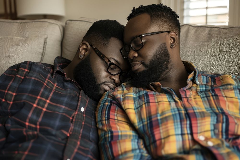 African American gay couple kissing glasses adult.