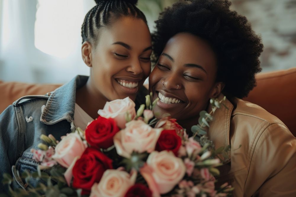 African american lesbian couple wedding rose laughing.