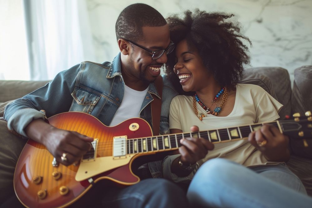 African American lessbian couple guitar musician glasses.