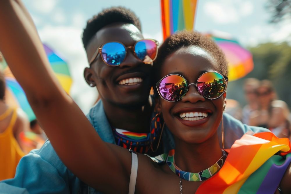 African American lgbtq couple celebrating at a parade photography sunglasses portrait.