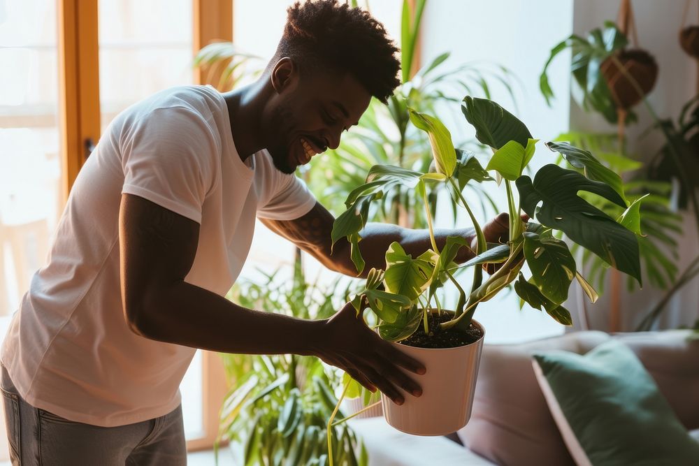 African American man plant gardening nature.