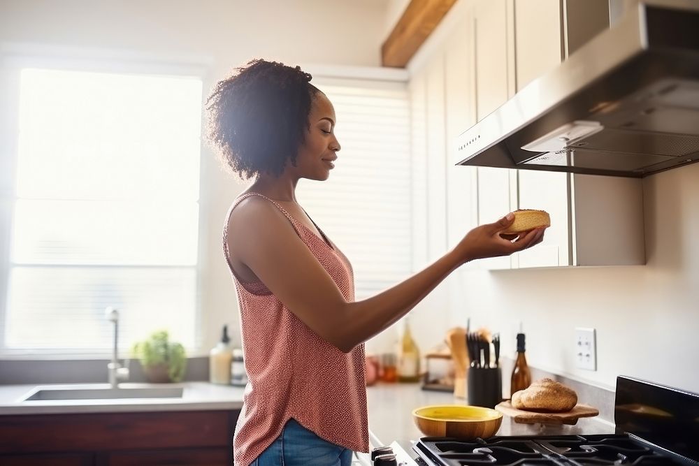 African American woman kitchen food adult.