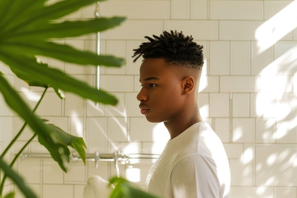 African American young man contemplation hairstyle portrait.