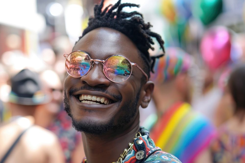 Handsome smiling black skin guy queer at LGBT parade outdoor sunglasses outdoors adult.