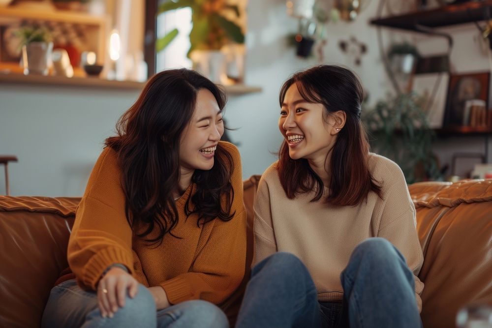 East asian female couple laughing women adult.