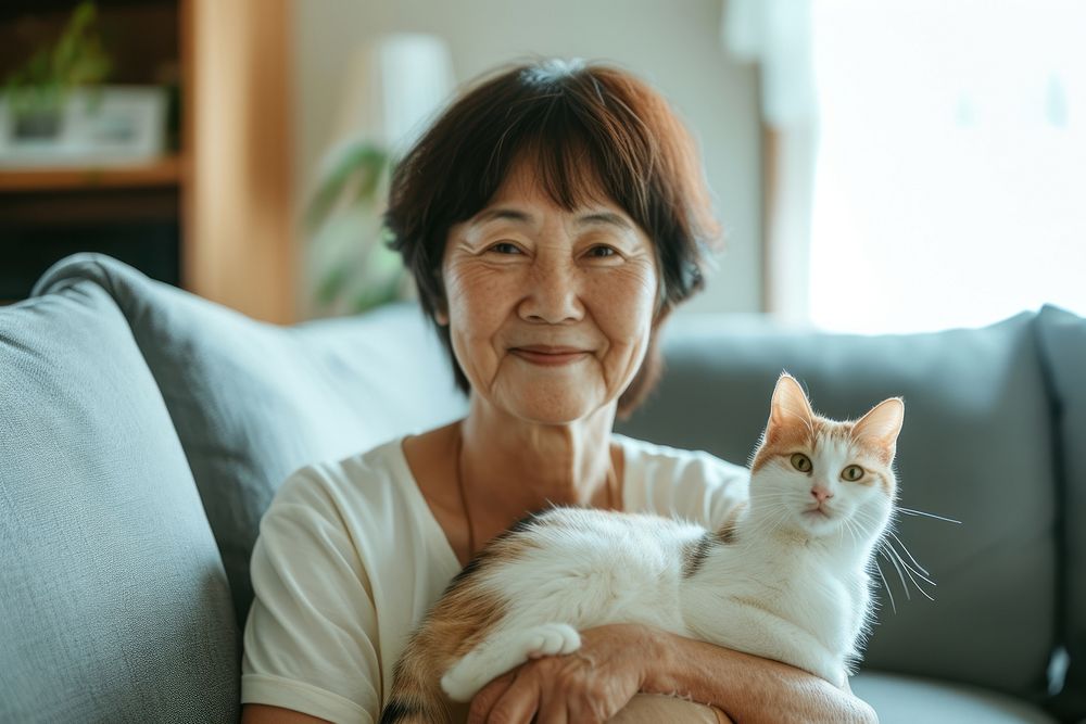 Japanese old women kitten portrait smiling.