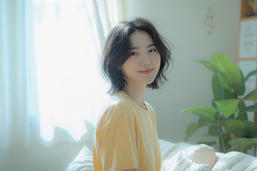 Korean female smiling adult hair.