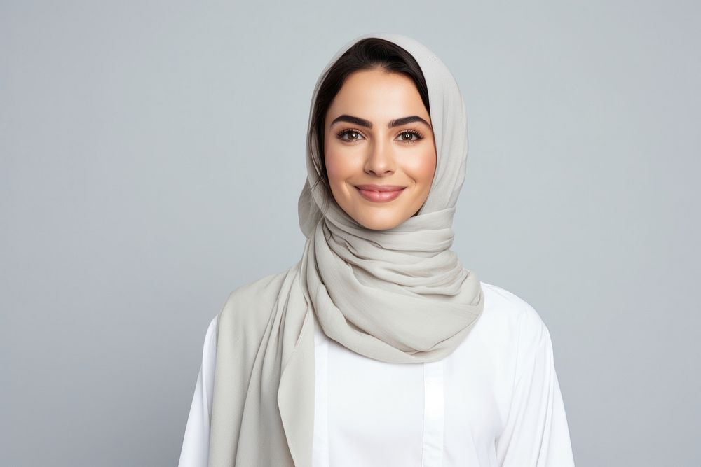 Middle eastern woman smiling hijab scarf.