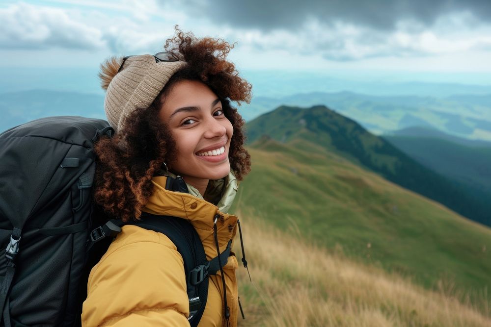 Mixed race teen woman backpack outdoors nature.