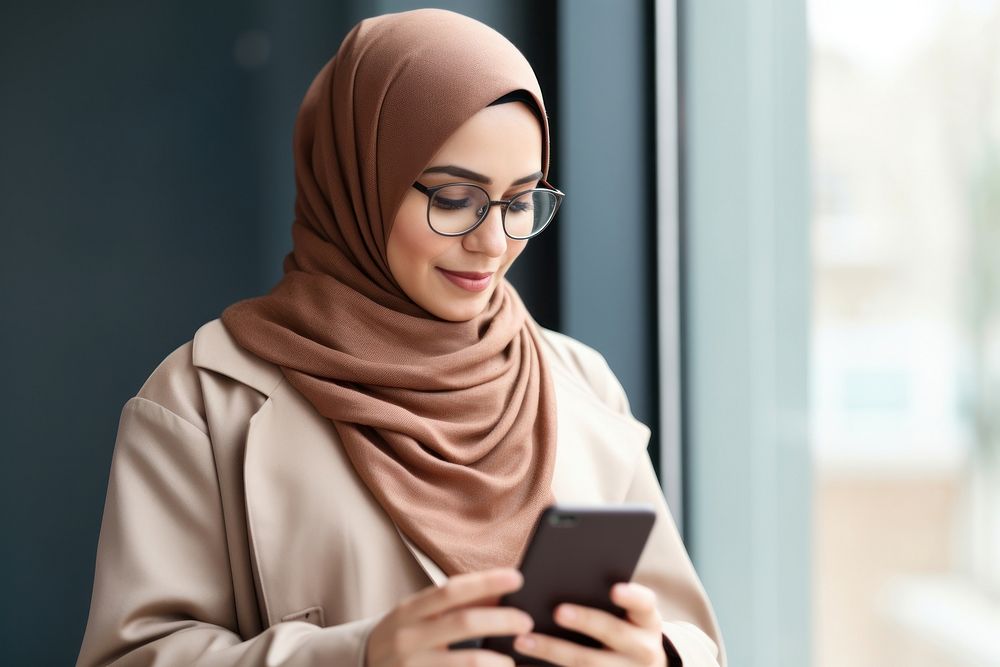 Muslim woman hijab portability technology.