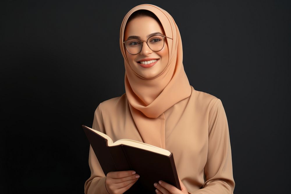 Muslim woman book publication glasses.