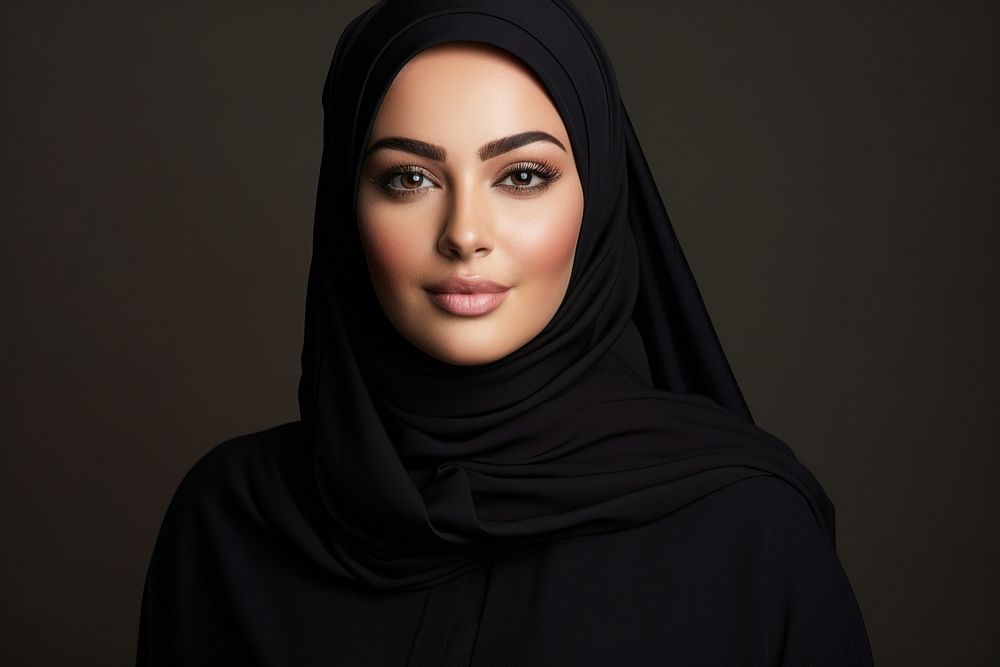 Plus size Middle eastern teen woman in abaya and hijab portrait fashion looking.