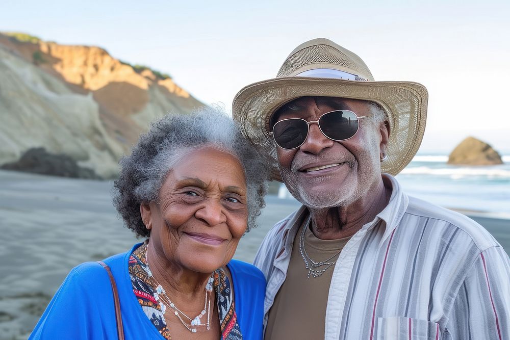 Senior Afican American lessbian couple photography portrait outdoors.