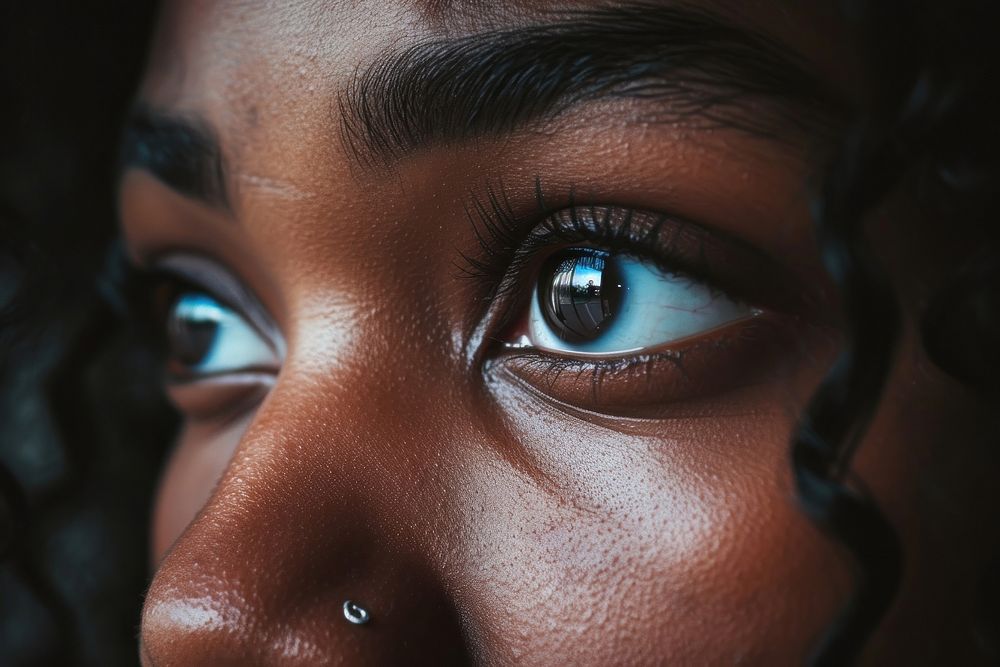 Black woman eyes adult skin portrait.
