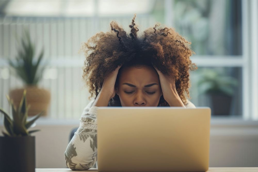 Business black woman laptop computer worried.
