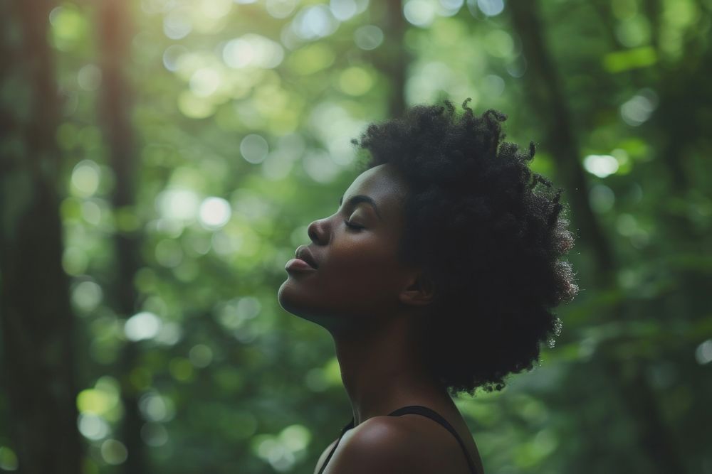 Black woman forest adult contemplation.