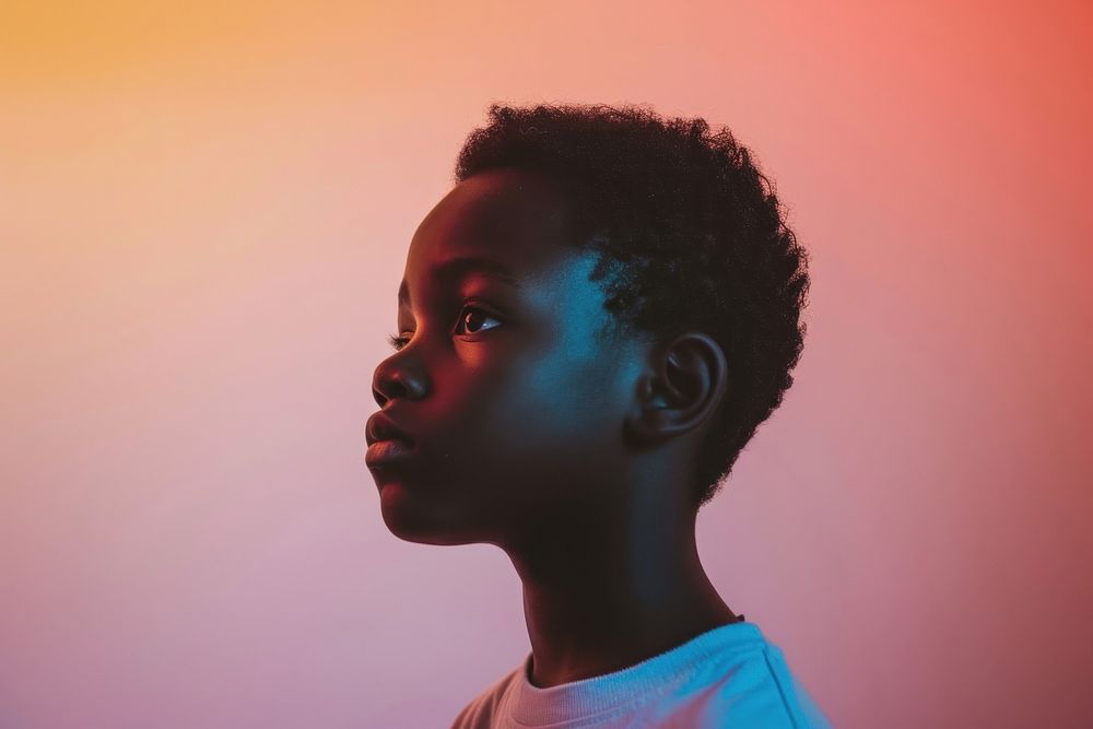Black kid in anxiety portrait contemplation hairstyle.