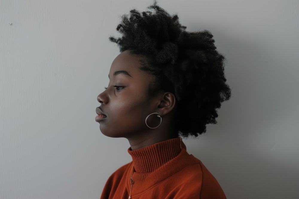 Black woman in anxiety portrait photography earring.