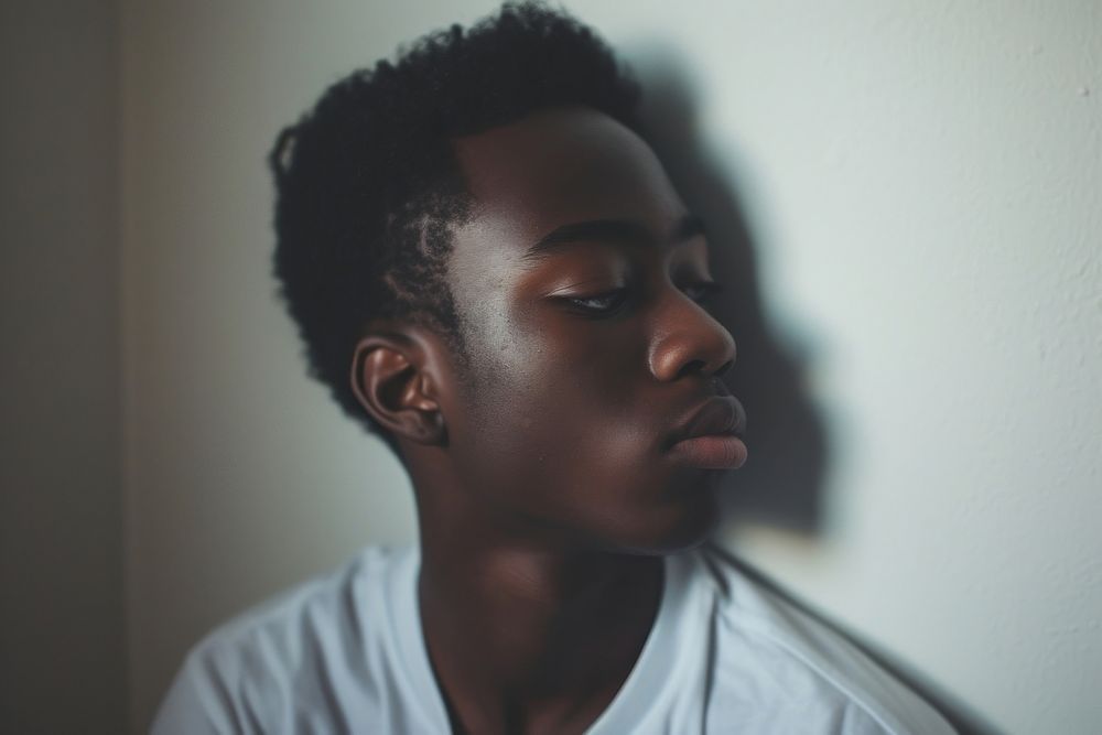 Black teen boy portrait sadness adult.