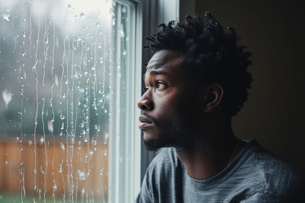 African American man looking window adult.